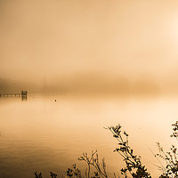 Buy canvas prints of Misty early morning lake in autumn by Alan Hill