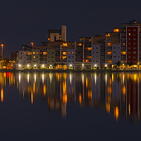 Buy canvas prints of The moon and cityscape lights, reflect off harbour by Alan Hill