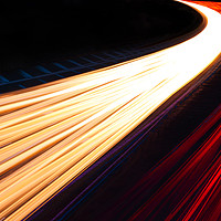Buy canvas prints of Light trails caused by multiple car headlights and tail lights by Alan Hill