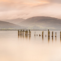 Buy canvas prints of Loch Lomond jetty and mountains at sunset by Alan Hill