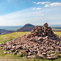 Buy canvas prints of Rock pile at the top of Eildon Hill North looking towards Eildon Mid Hill and Eildon Wester Hill by Dave Collins