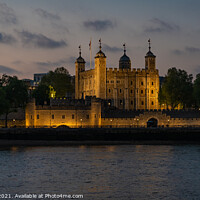 Buy canvas prints of Tower of London Illuminated at dusk from the south bank walkway by Tower Bridge by Dave Collins