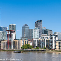 Buy canvas prints of View of the Docklands Skyscrapers from the river Thames looking North East, London, UK by Dave Collins