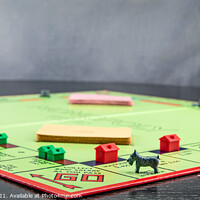 Buy canvas prints of Passing Go on a Monopoly Board by Dave Collins