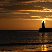 Buy canvas prints of Sunrise behind the light tower at the entrance of Berwick upon tweed harbour by Dave Collins