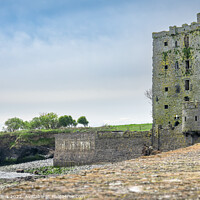 Buy canvas prints of Carrigaholt Castle Looking Inland from the fishing Pier by Dave Collins