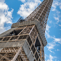 Buy canvas prints of Quirky angle looking up at the Eiffel Tower, Paris, France by Dave Collins