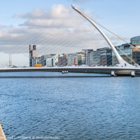 Buy canvas prints of The Samuel Beckett Bridge over the River Liffey in Dublin, Ireland (Looking downstream from the North bank) by Dave Collins