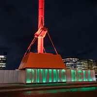 Buy canvas prints of The Diving Bell used in the building of Dublin Port’s quay walls illuminated at night, Dublin, Ireland by Dave Collins