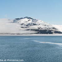 Buy canvas prints of Fog on the mountains and sea in Passage Canal, Whittier, Alaska USA by Dave Collins