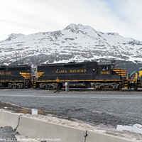 Buy canvas prints of Outdoor Alaska Railroad Locomotives 3001 3006 and  3009 with snow covered mountains behind, Whittier, Alaska, USA by Dave Collins