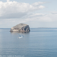 Buy canvas prints of A small motor boat leaving Bass Rock, Firth of Forth, Scotland by Dave Collins