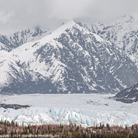 Buy canvas prints of Matanuska Glacier face with snow covered mountains behind in Alaska, USA by Dave Collins