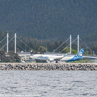 Buy canvas prints of Alaska Airlines Boeing 737 landing at  Sitka Rocky Gutierrez Airport, Alaska, USA by Dave Collins