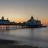 Buy canvas prints of Sunrise at Eastbourne Pier, Sussex, England by Dave Collins