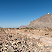 Buy canvas prints of Track through the desert Harim mountains  in Musandam, Oman by Dave Collins