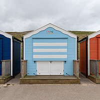 Buy canvas prints of Colourful beach huts shut for winter, Gorleston, Norfolk, England by Dave Collins