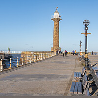 Buy canvas prints of West Pier harbour lighthouse from the west pier, Whitby, Yorkshire, England by Dave Collins