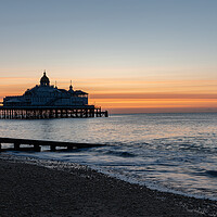Buy canvas prints of Sunrise over Eastbourne Pier, East Sussex, England by Dave Collins