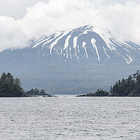 Buy canvas prints of Islands and Snow Topped Mountains at Sitka, Alaska, USA. by Dave Collins