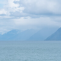 Buy canvas prints of Distance Mountains in mist in Prince William Sound, Alaska, USA by Dave Collins