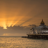 Buy canvas prints of Sunrise over Eastbourne Pier by Dave Collins