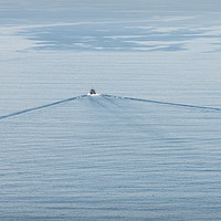 Buy canvas prints of A small boat and its wake on a calm sea. by Dave Collins