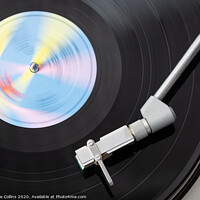 Buy canvas prints of Vinyl Record Playing on a Record Player by Dave Collins