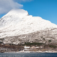 Buy canvas prints of Snow covered hills on the Norwegian Coast in winter by Dave Collins