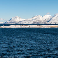 Buy canvas prints of Snow covered hills on the Norwegian Coast in winter by Dave Collins