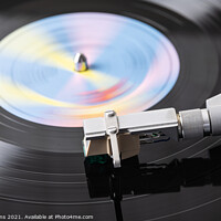 Buy canvas prints of Vinyl Record Playing on a Record Player by Dave Collins