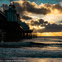 Buy canvas prints of Sunrise and sunrays over Eastbourne Pier by Dave Collins