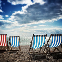 Buy canvas prints of Four deckchairs on the beach at Brighton, East Sus by Richard Harris