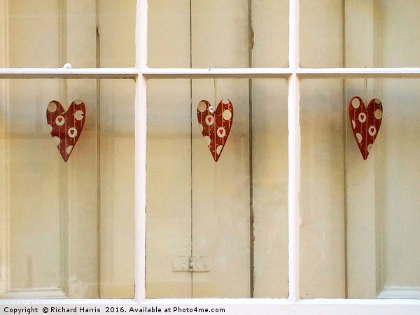 Decorative hearts displayed inside shuttered windo Picture Board by Richard Harris