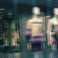 Buy canvas prints of Abstract Mannequins in shop window by Larisa Siverina