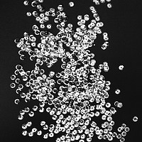 Buy canvas prints of Silver sequins on black paper by Larisa Siverina