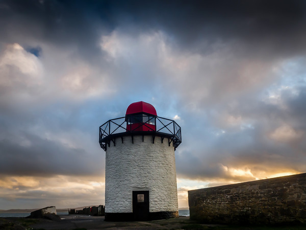 The Lighthouse at Burry Port, Carmarthenshire. Picture Board by Colin Allen