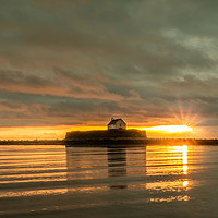 Buy canvas prints of Sunset over St Cywfan's Church in the Sea. by Colin Allen