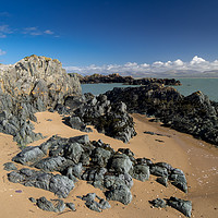 Buy canvas prints of Pillow Lava Rocks on Newborough Sands, Anglesey. by Colin Allen