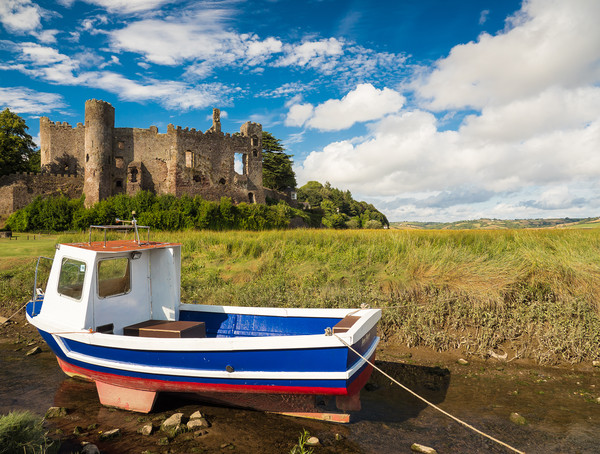 Laugharne Castle and a Fishing Boat.  Picture Board by Colin Allen