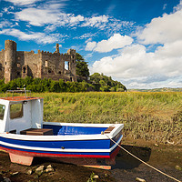 Buy canvas prints of Laugharne Castle and a Fishing Boat.  by Colin Allen