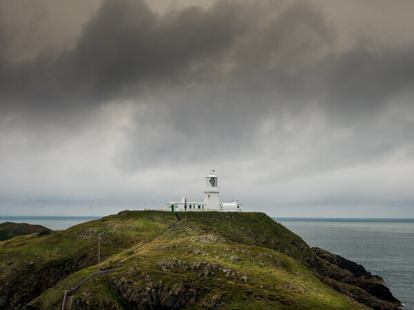 Strumble Head Lighthouse, Pembrokeshire, Wales. Picture Board by Colin Allen