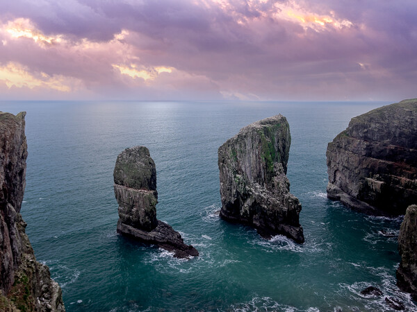 Stack Rocks Sunset, Pembrokeshire. Picture Board by Colin Allen