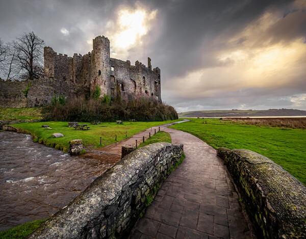 Laugharne Castle. Carmarthenshire, Wales. Picture Board by Colin Allen