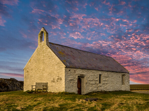 St Cwyfan's Church. Anglesey. Picture Board by Colin Allen