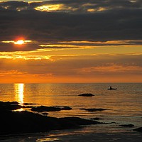 Buy canvas prints of             Ocean Sunset with Paddle Boarder       by Alun Williams