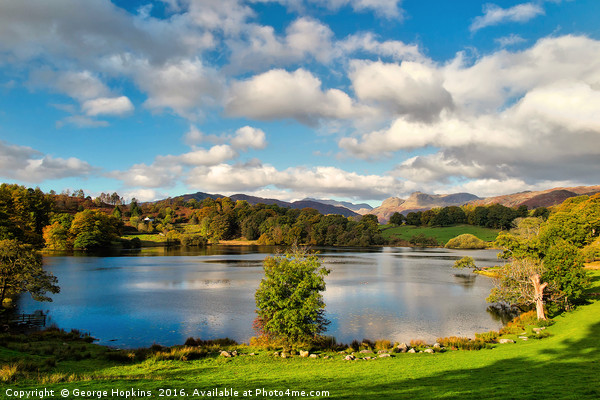 Autumn at Loughrigg Tarn Picture Board by George Hopkins