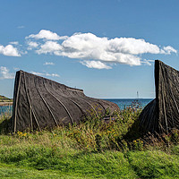 Buy canvas prints of The Upturned Boats of Lindisfarne Island by George Hopkins