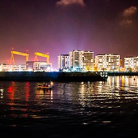 Buy canvas prints of Harland & Wolfe cranes at night by Jon McFarland