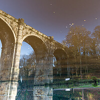 Buy canvas prints of upside down reflection of Knaresborough Viaduct Yorkshire by mike morley